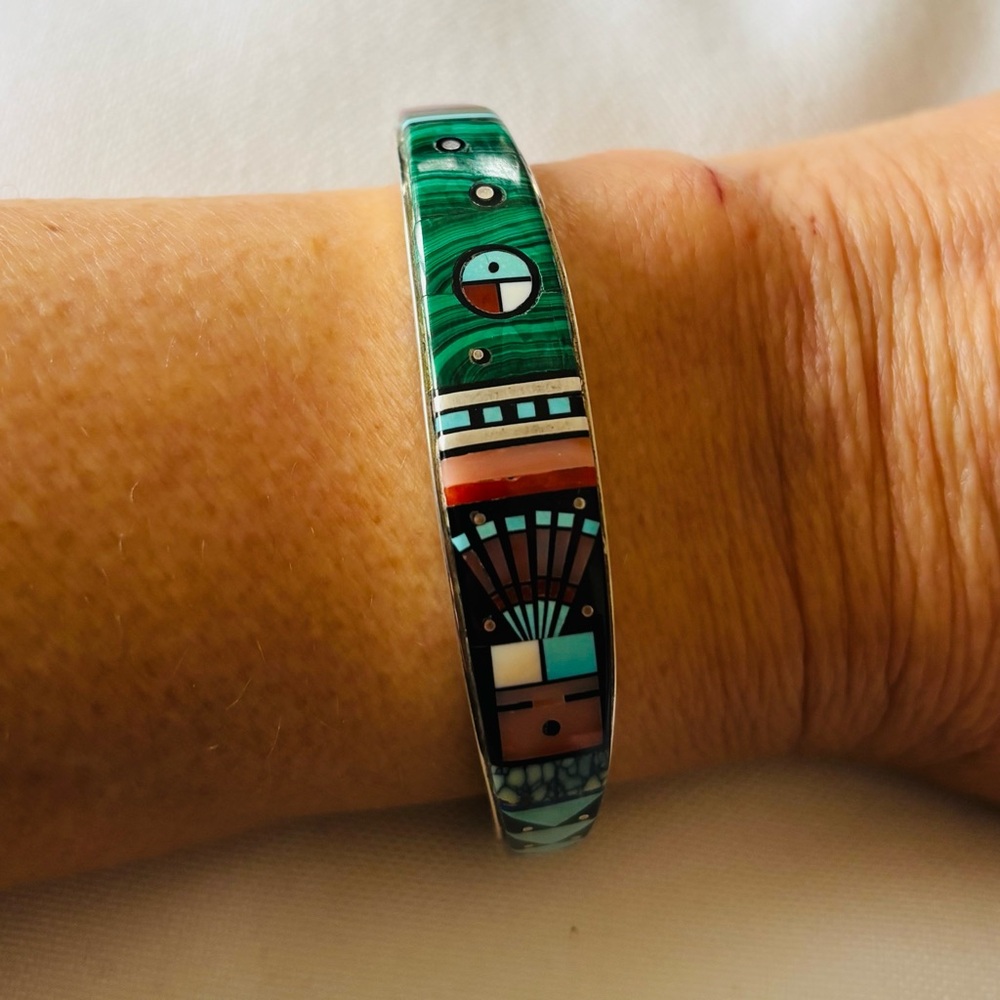 Navajo cuff by Ervin Tsosie, famous for intricate inlay work.